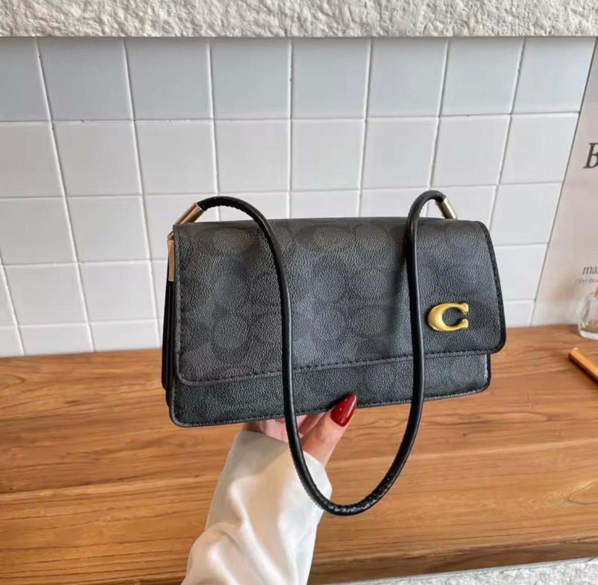 Coach black hand bag