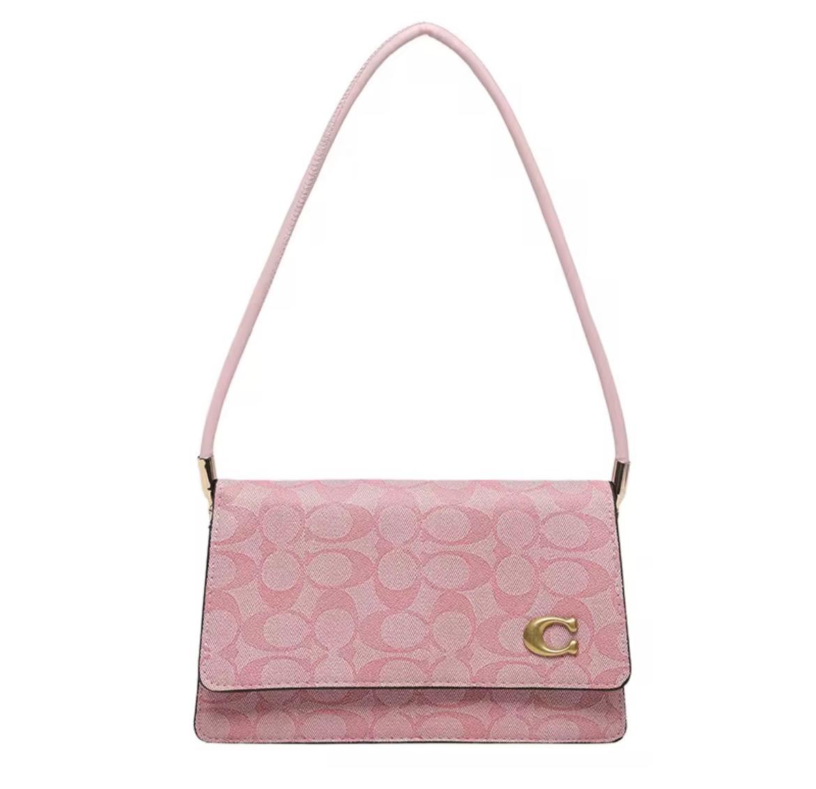 Coach pink hand bag