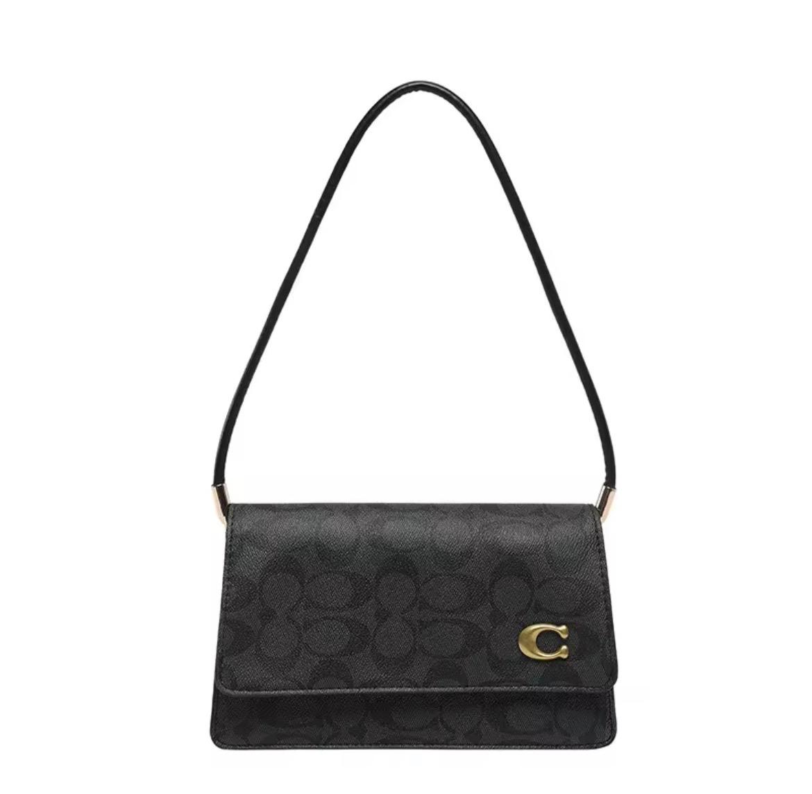 Coach black hand bag
